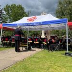 A band playing under a tent