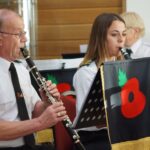 Two clarinet players reading music