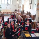 Members of a band looking at the camera