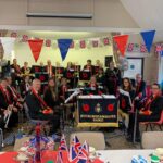 RBL Bucks band posing for the camera at Silver Sunday, 2022